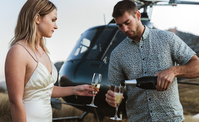 Champagne couple helicopter