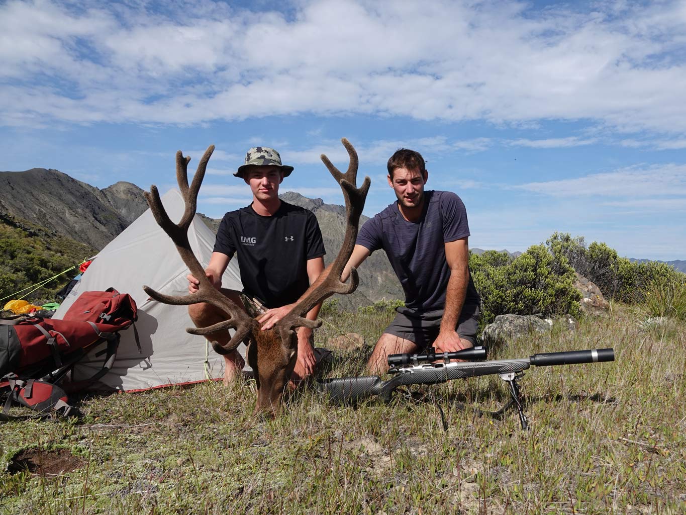 two men with stag head